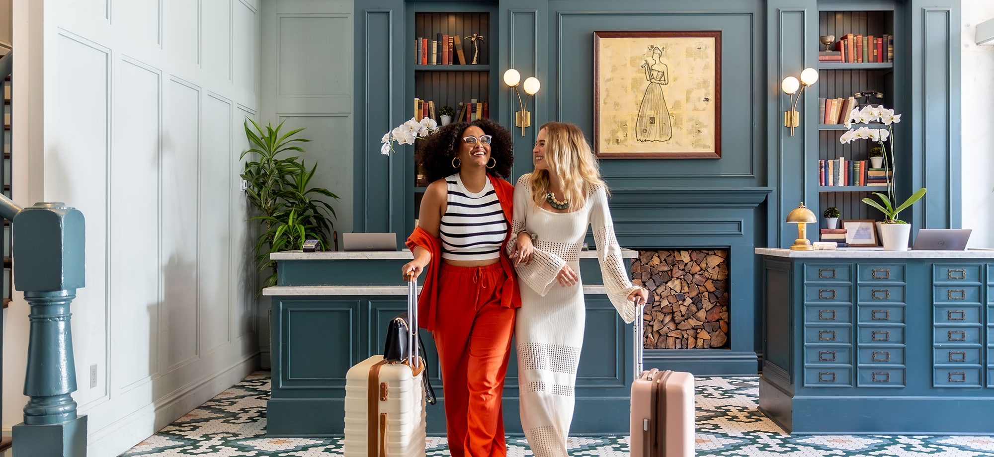 Friends checking in a hotel reception
