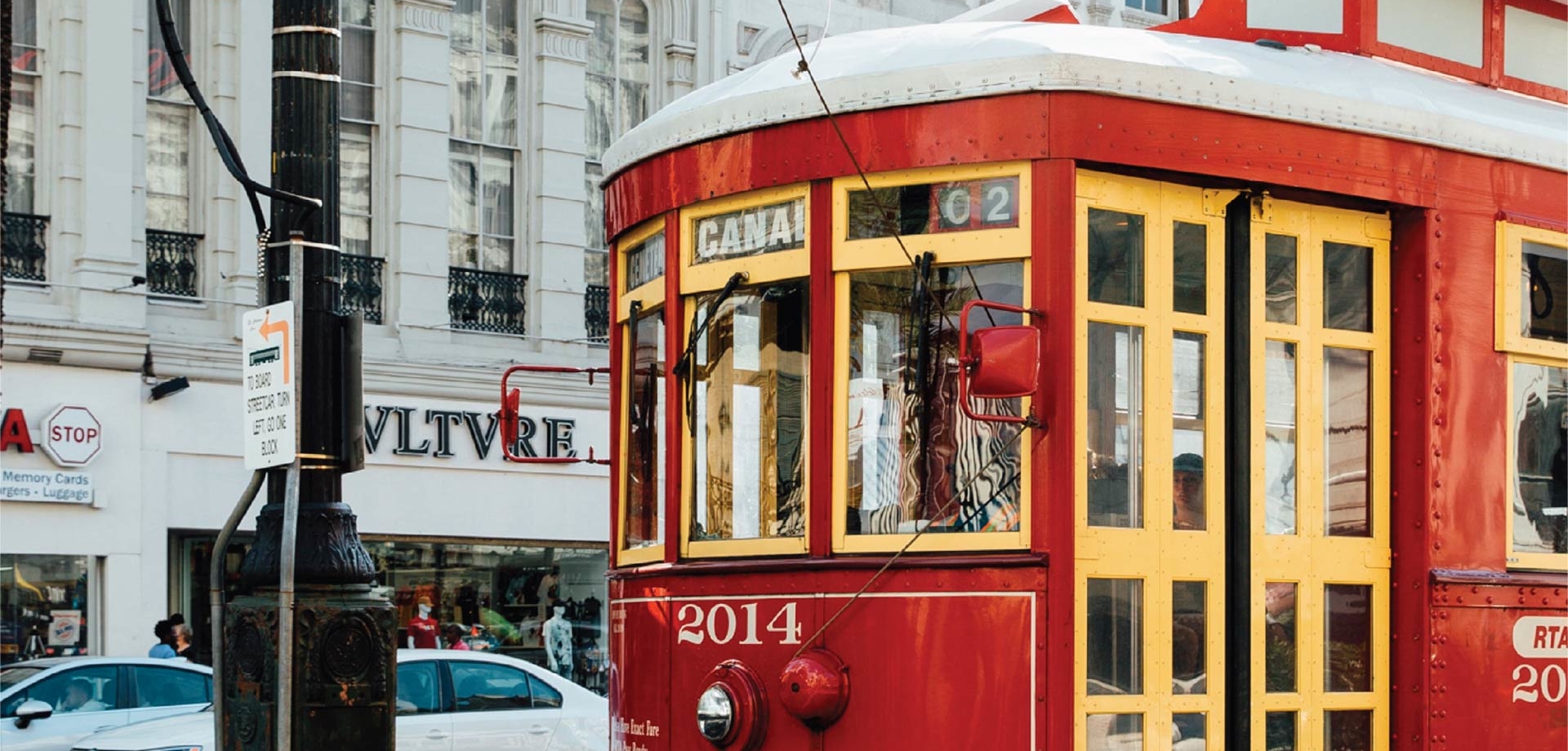 cable car driving down canal street