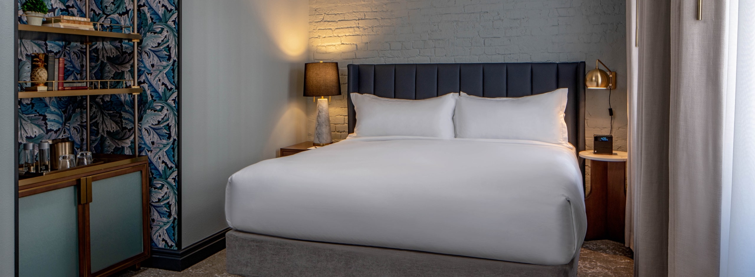 A one queen bed room in The Eliza Jane Hotel in New Orleans