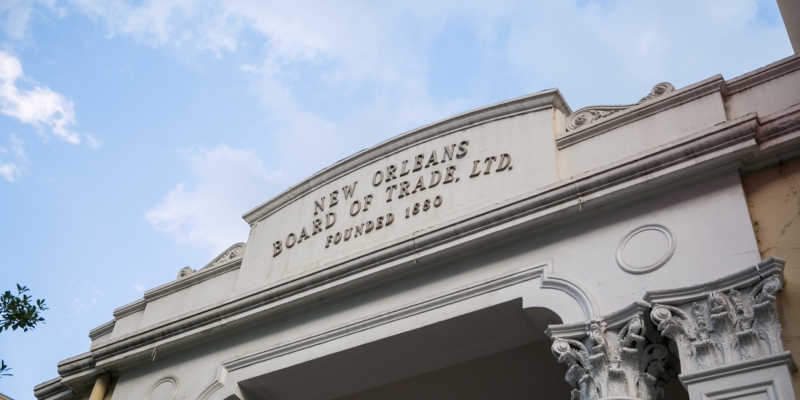 Historic building exterior with signage for Board of Trade, LTD.